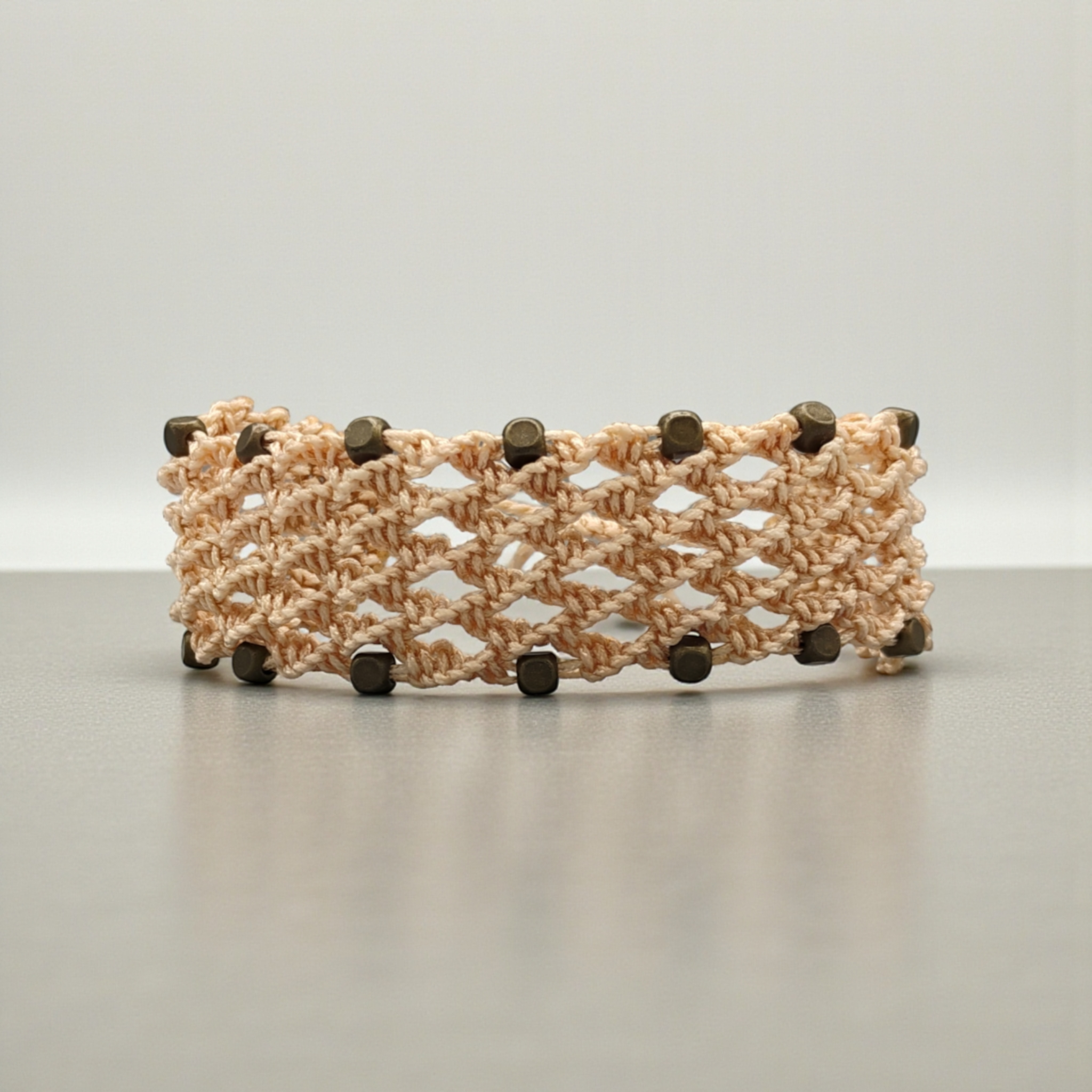 PULSERA REJILLA BEIGE