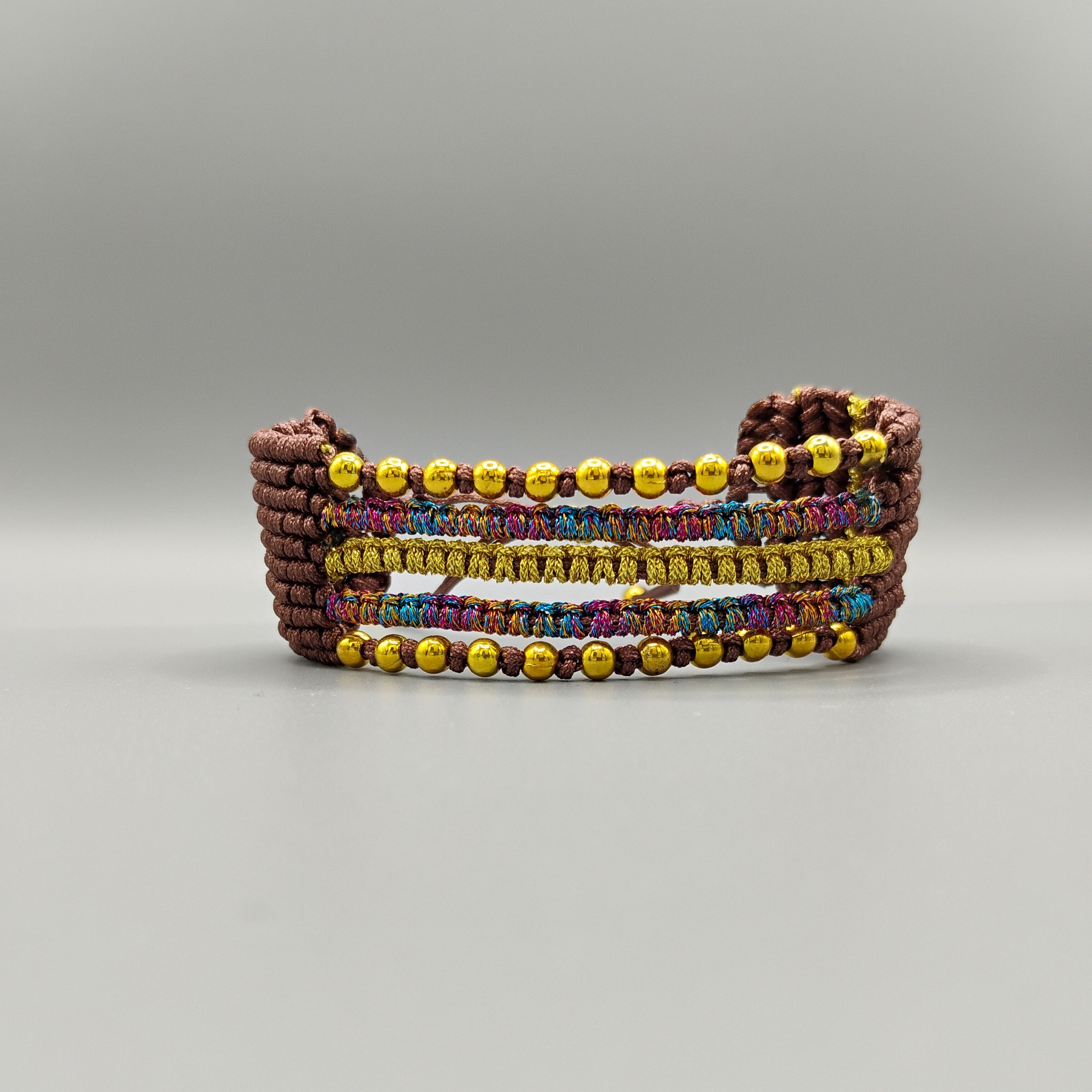 BRAZALETE MARRÓN Y DORADO