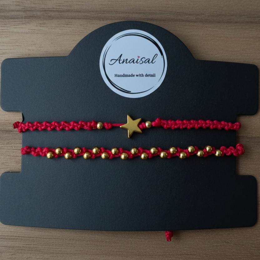 CONJUNTO DE DOS PULSERAS ROJAS CON ESTRELLA