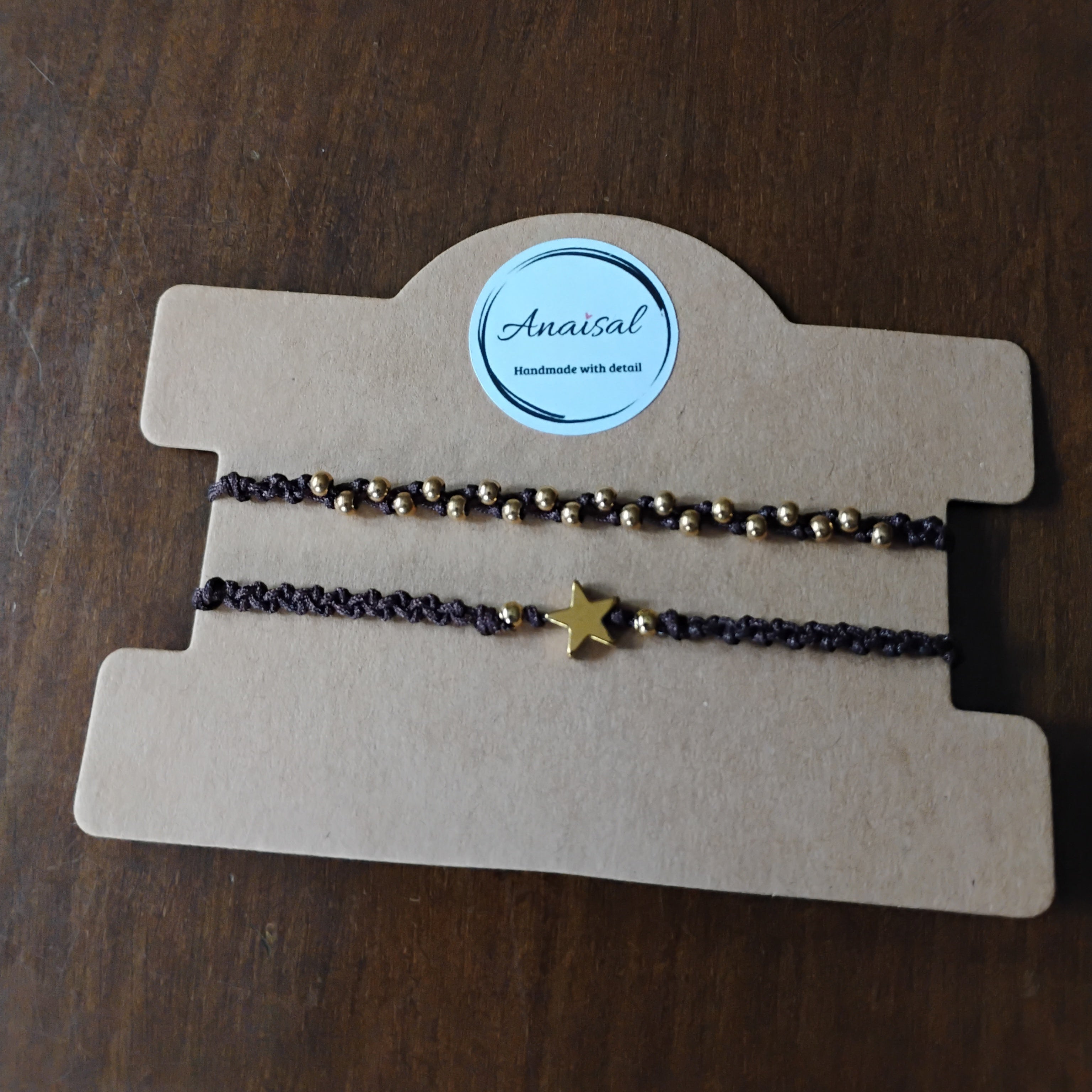 CONJUNTO DE DOS PULSERAS MARRONES CON ESTRELLA