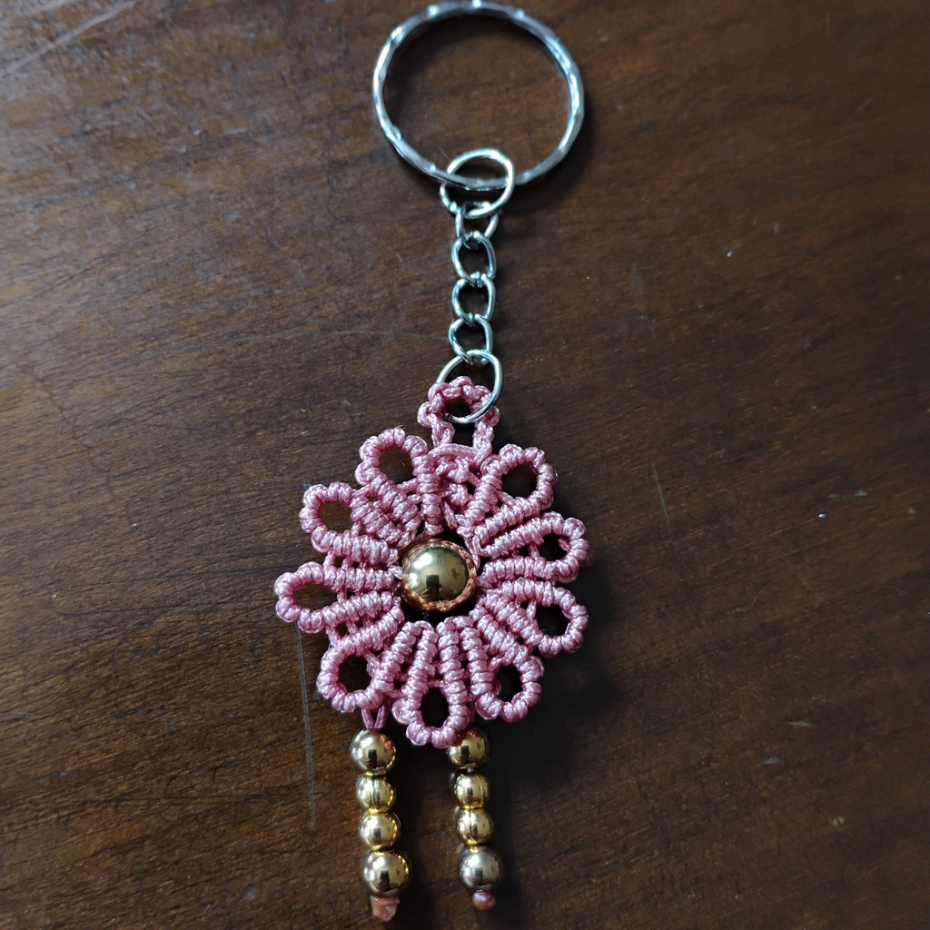 LLAVERO FLOR DE SOL ROSA PALO