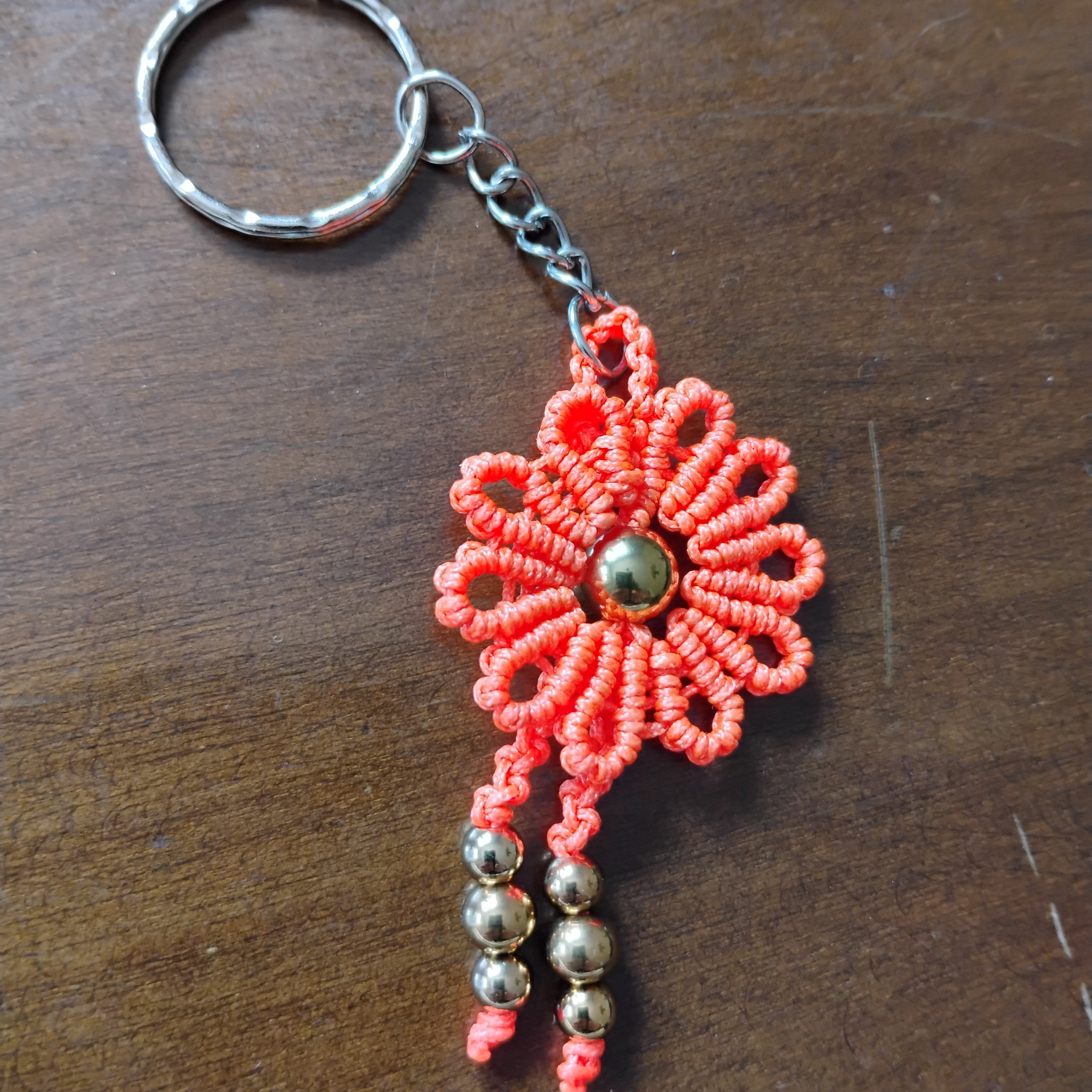 LLAVERO FLOR DE SOL NARANJA