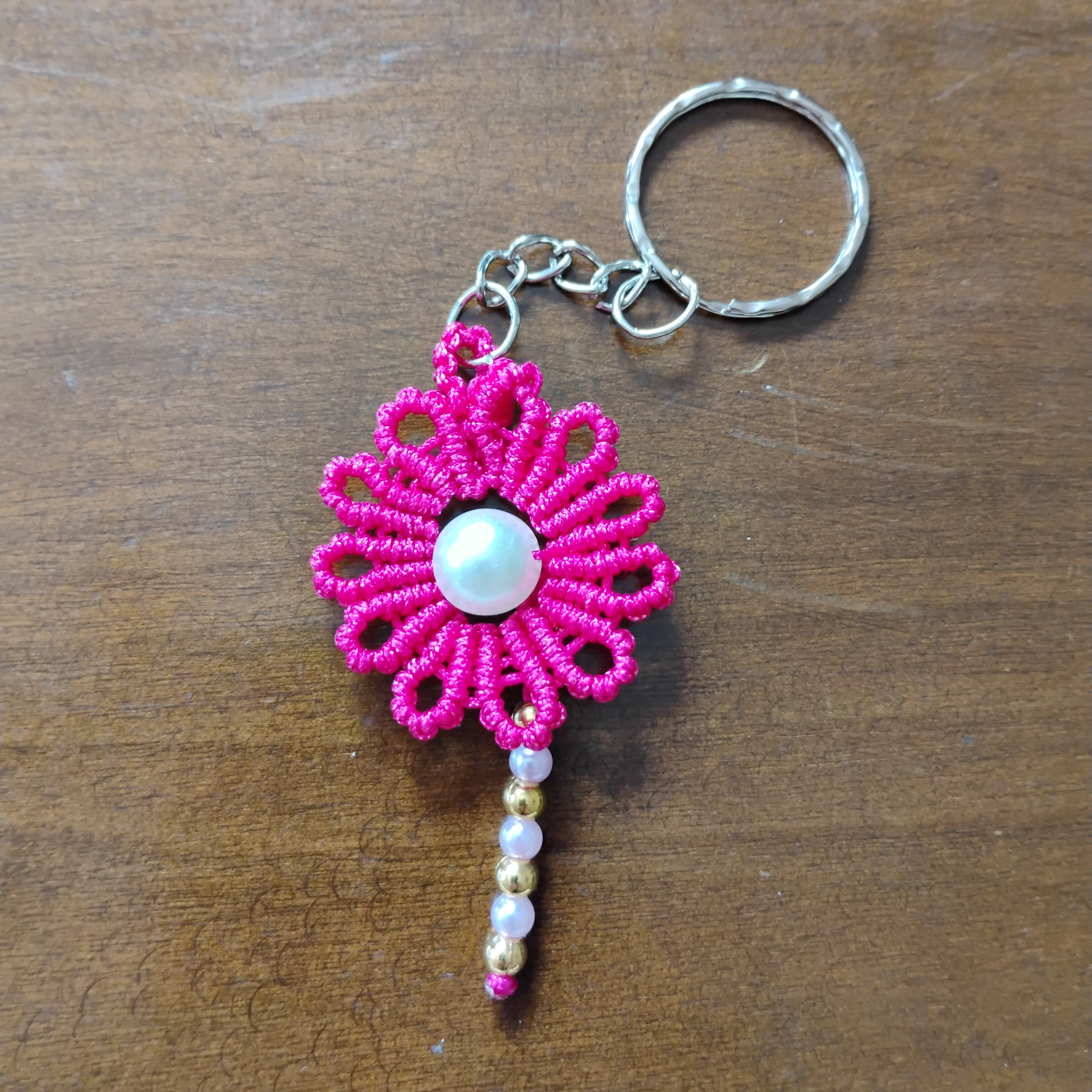 LLAVERO FLOR DE SOL FUCSIA