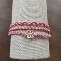 PULSERA TRIPLE ROSA PALO CON FLOR