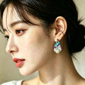 PENDIENTES PERLA TONOS AZULES